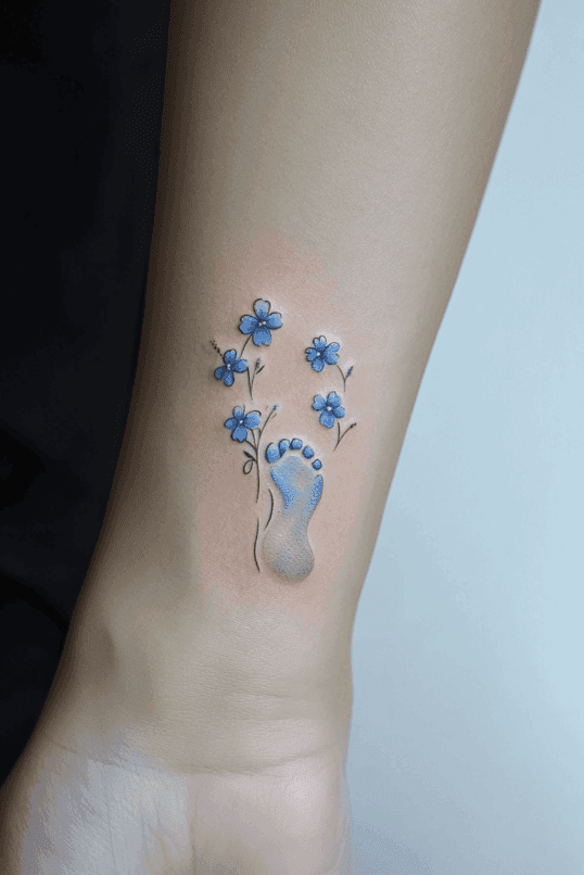 Baby Footprint with Blue Flowers Tattoo