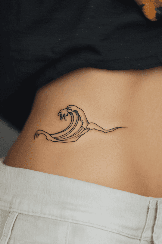 Minimalist Wave Rib Tattoo