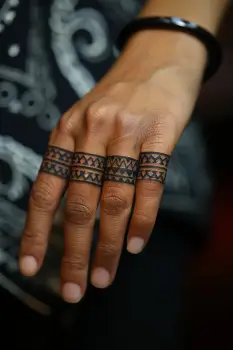 finger tattoos for women 6